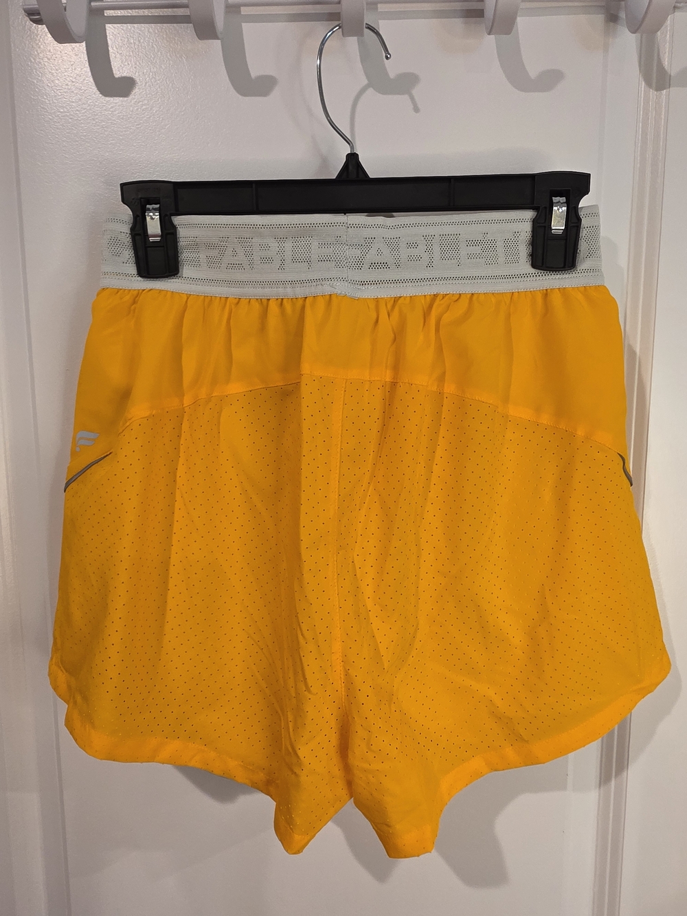 Fabletics Perforated 5" Run Shorts - Picture 2 of 4